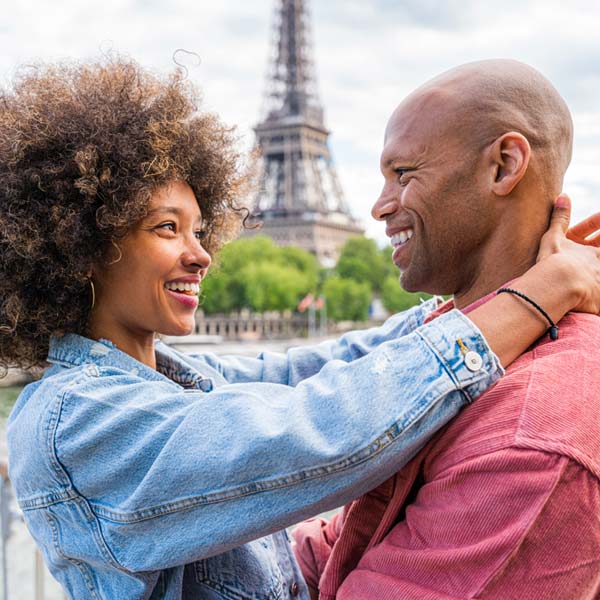 couple rekindling their relationship on a trip to France with Eiffel tower in the background