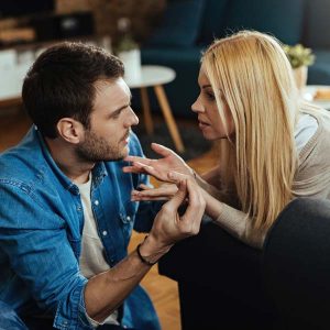 Young couple discussing about problems in their relationship