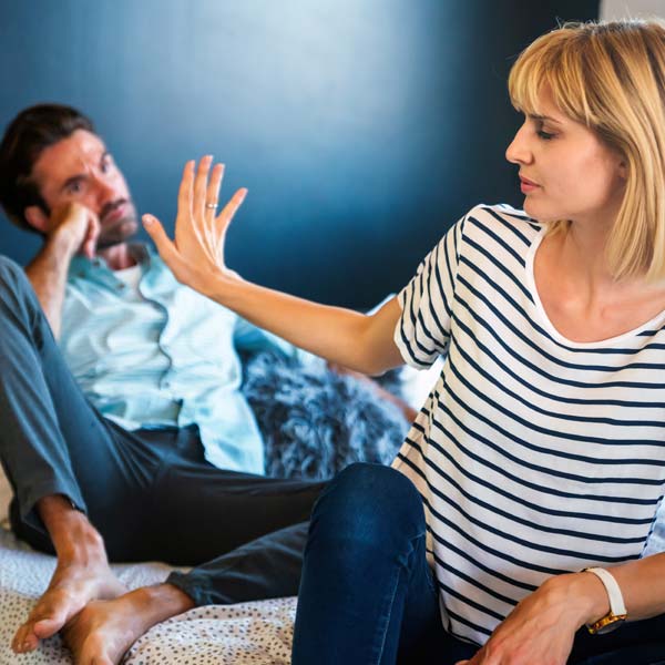 woman being assertive while arguing with spouse