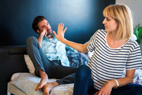 woman being assertive while arguing with spouse